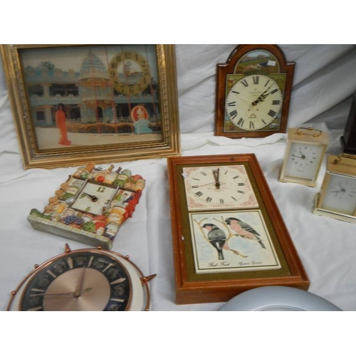 676 - 14 assorted wall clocks.