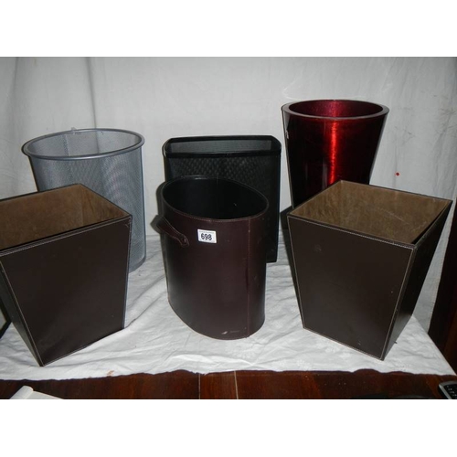 698 - 3 good hide covered waste paper bins and one other.