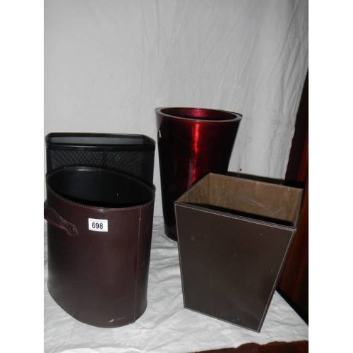 698 - 3 good hide covered waste paper bins and one other.