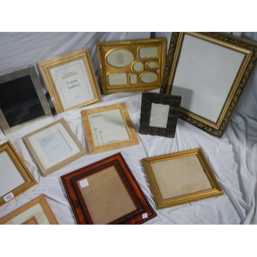 702 - 18 new photograph frames.