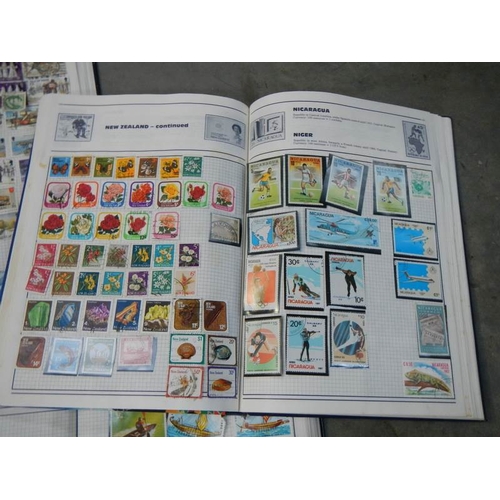 712 - 6 part filled stamp albums.