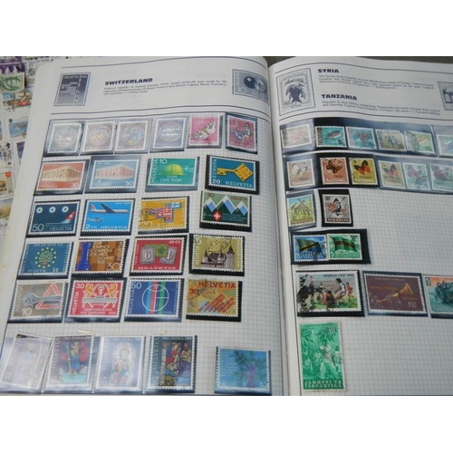 712 - 6 part filled stamp albums.