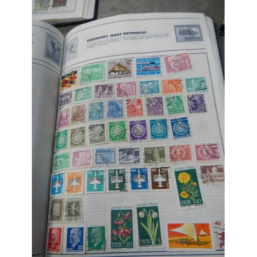 712 - 6 part filled stamp albums.