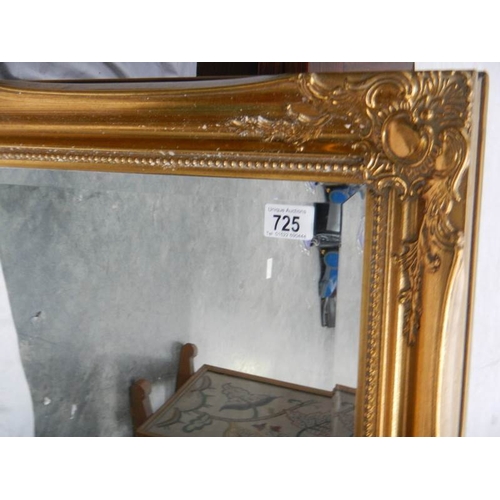 725 - A good gilt framed bevel edged mirror in excellent condition, 85 x 64 cm.