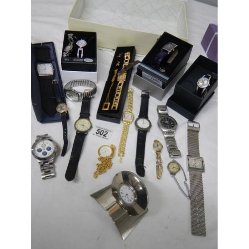 502 - A good lot of Ladies and Gents watches including a 2 piece clock.