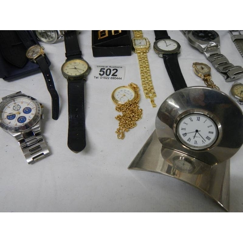 502 - A good lot of Ladies and Gents watches including a 2 piece clock.