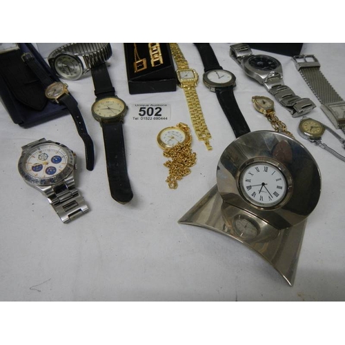 502 - A good lot of Ladies and Gents watches including a 2 piece clock.