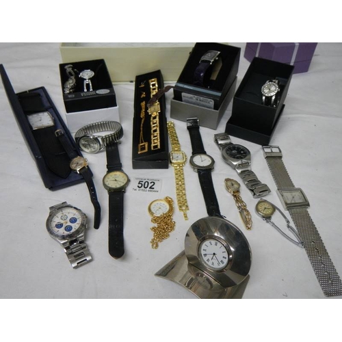 502 - A good lot of Ladies and Gents watches including a 2 piece clock.