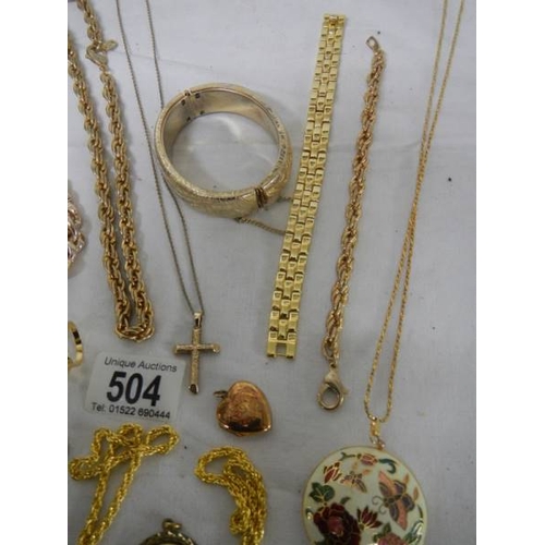 504 - A mixed lot of gold coloured jewellery.