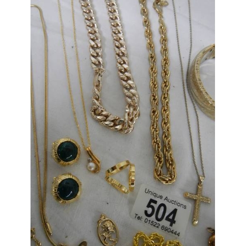 504 - A mixed lot of gold coloured jewellery.