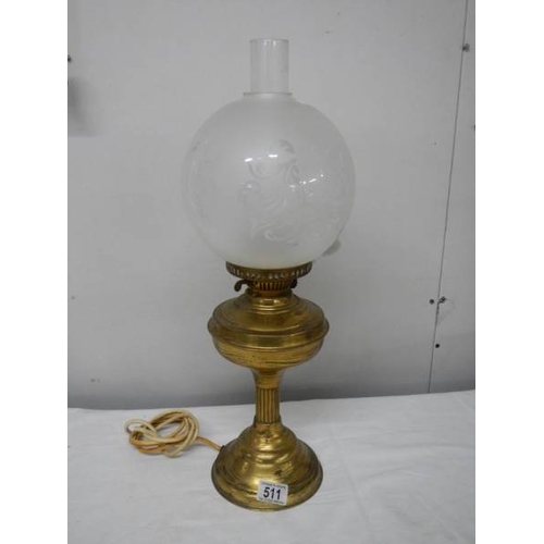 511 - A brass half Nelson style electric table lamp complete with shade but needs plug.