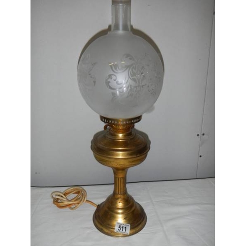 511 - A brass half Nelson style electric table lamp complete with shade but needs plug.