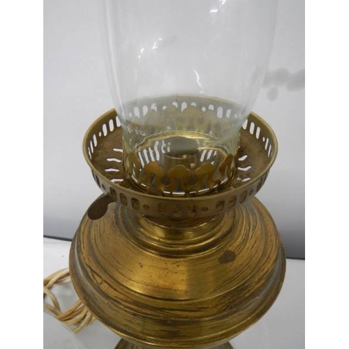 511 - A brass half Nelson style electric table lamp complete with shade but needs plug.