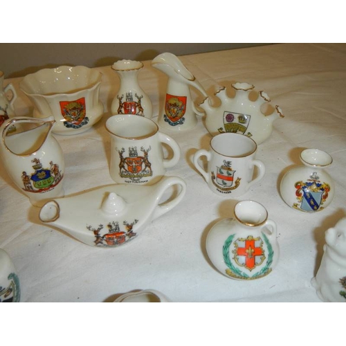 513 - 21 pieces of assorted crested china, all in good condition.