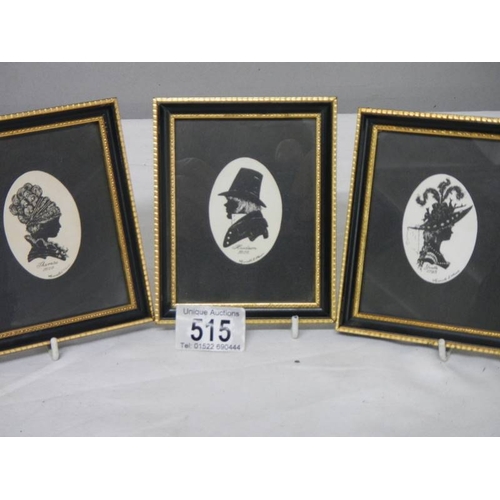 515 - 2 framed and glazed double silhouettes and a single silhouette of Victorian people.