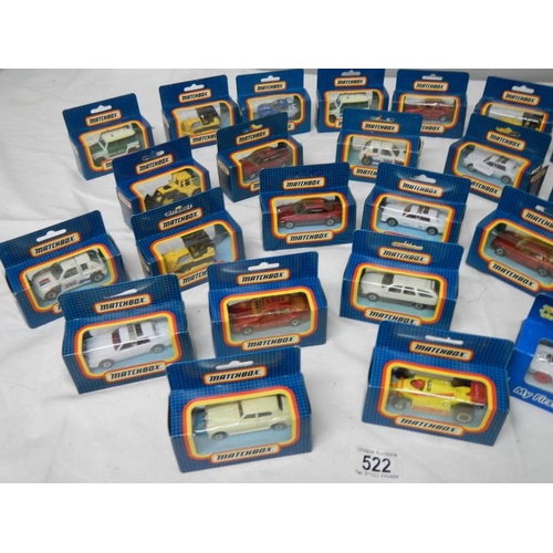 522 - 26 mint and boxed Matchbox model vehicles.