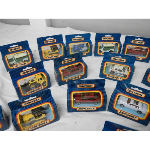 522 - 26 mint and boxed Matchbox model vehicles.