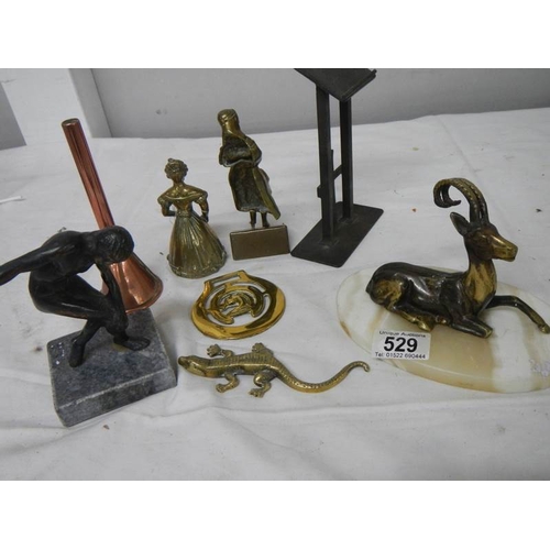 529 - A mixed lot of brass ware including miniature lantern, marble base figure etc.,