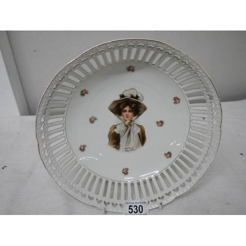 530 - A hand painted and signed dish, 26cm diameter, in good condition.