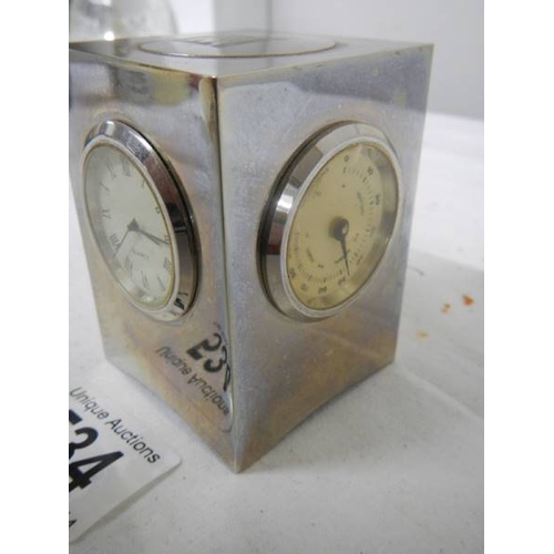 534 - A small three sided clock/thermometer/hydrometer, 7 cm tall.