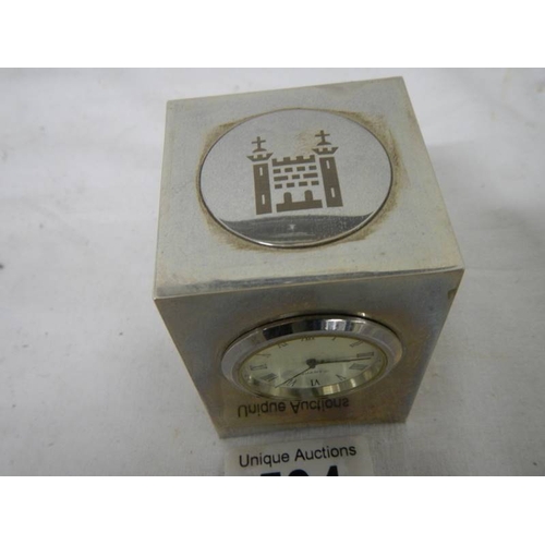 534 - A small three sided clock/thermometer/hydrometer, 7 cm tall.