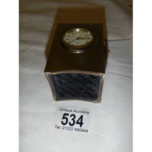 534 - A small three sided clock/thermometer/hydrometer, 7 cm tall.