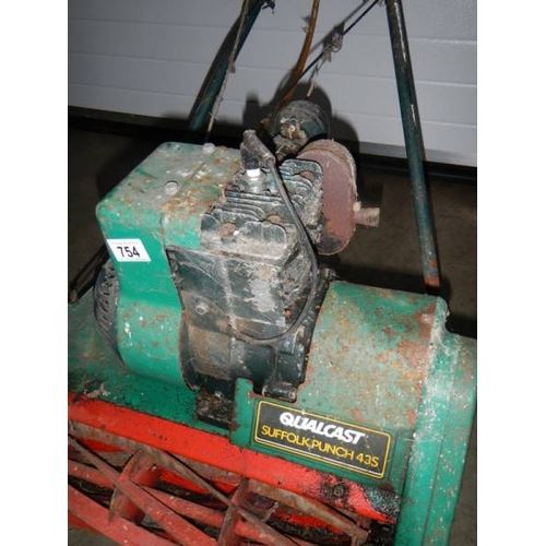 754 - An old Qualcast Suffolk Punch 435 petrol mower.