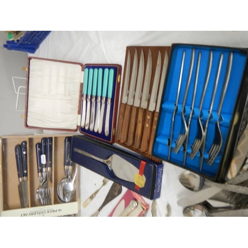 788 - A mixed lot of cutlery including boxed sets, sugar nips etc.,