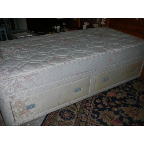 798 - A 3ft divan bed with pine headboard, in clean condition.