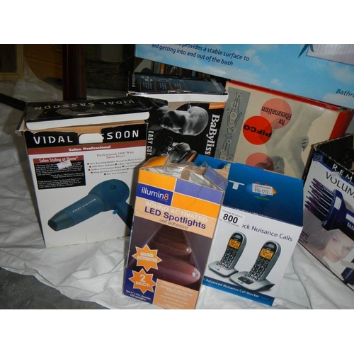 800 - A quantity of boxed hair dryers, bath board etc.,