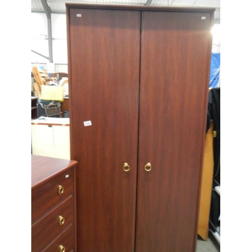 816 - A 2 door wardrobe and a 5 drawer chest, in good clean condition.