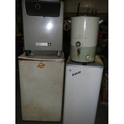 819 - 2 vintage spin dryers, a vintage heater and a vintage water urn.