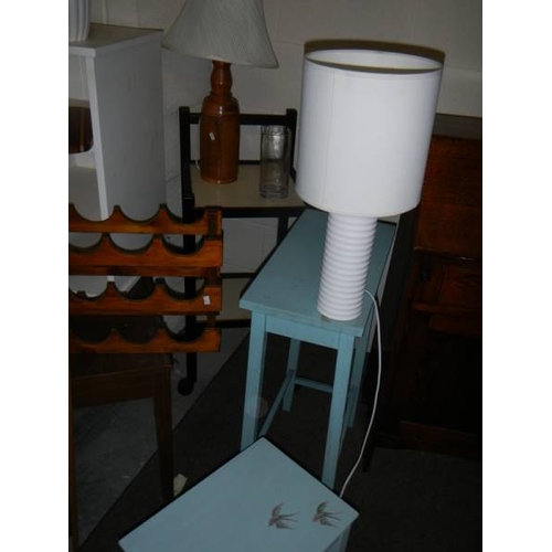 829 - A good lot of assorted wooden items including low tables, folding table, lamps etc.,