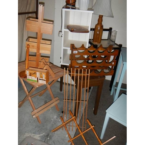 829 - A good lot of assorted wooden items including low tables, folding table, lamps etc.,