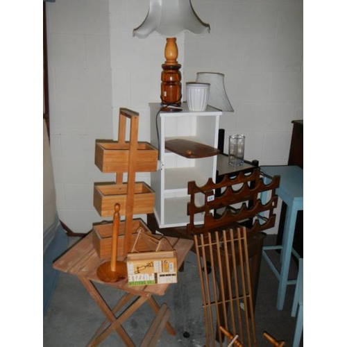 829 - A good lot of assorted wooden items including low tables, folding table, lamps etc.,