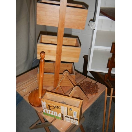 829 - A good lot of assorted wooden items including low tables, folding table, lamps etc.,