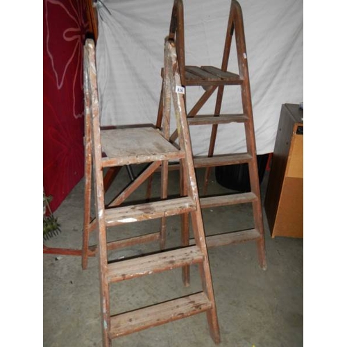 836 - 2 old wooden step ladders.