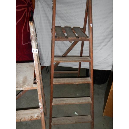 836 - 2 old wooden step ladders.