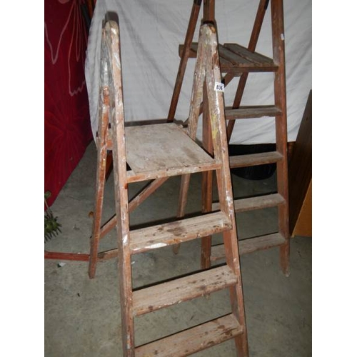 836 - 2 old wooden step ladders.