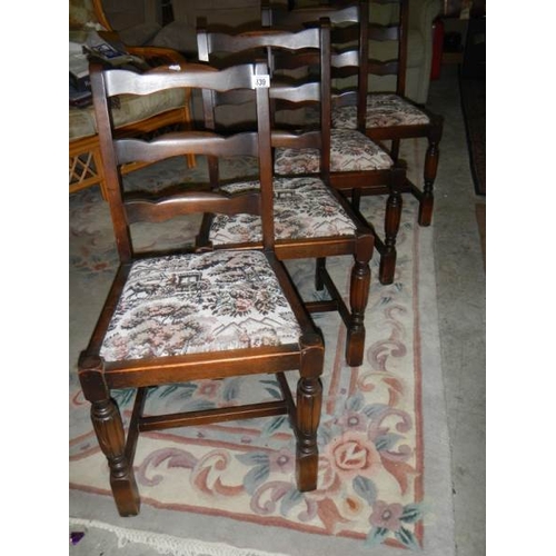 839 - A set of 4 dining chairs.