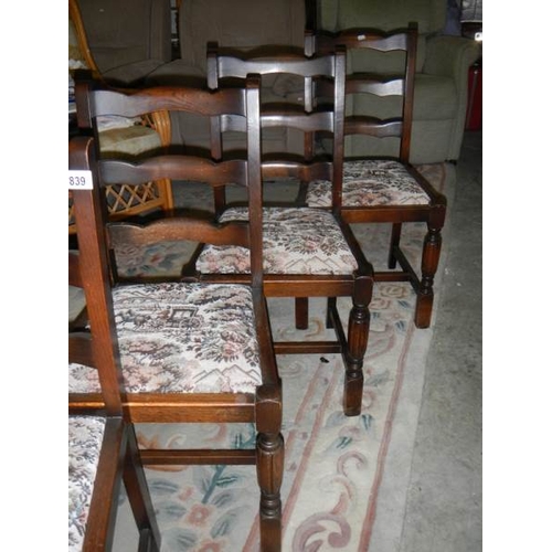 839 - A set of 4 dining chairs.