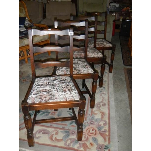 839 - A set of 4 dining chairs.