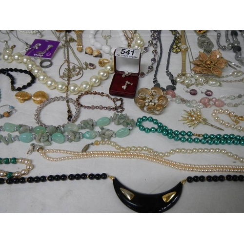 541 - A good large lot of costume jewellery including necklaces, earrings, bracelets, wrist watch etc., al... 