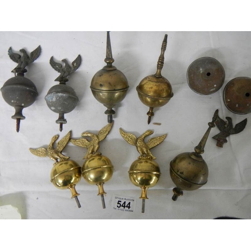 544 - A quantity of 19/20th century brass grandfather clock hood finials including 3 new reproduction exam... 