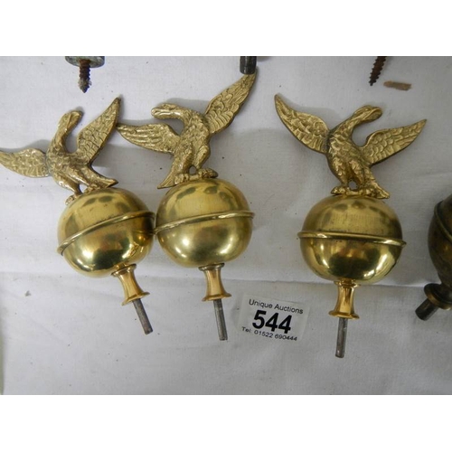 544 - A quantity of 19/20th century brass grandfather clock hood finials including 3 new reproduction exam... 