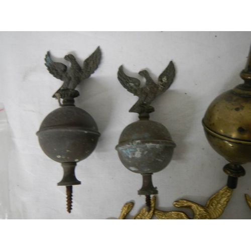 544 - A quantity of 19/20th century brass grandfather clock hood finials including 3 new reproduction exam... 