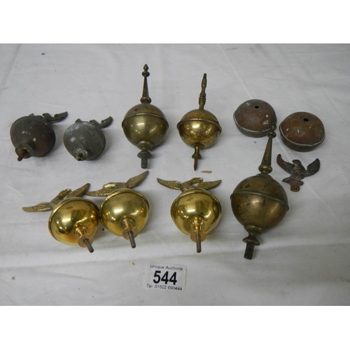 544 - A quantity of 19/20th century brass grandfather clock hood finials including 3 new reproduction exam... 