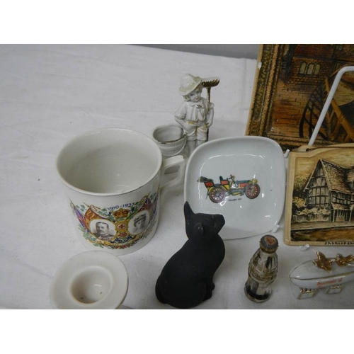 545 - A mixed lot including Osborne plaque, Royal Worcester Prisoner of War dish, Wade, Tweedsmuir glass p... 