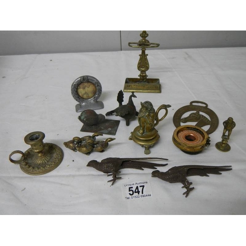 547 - A mixed lot of small brass and bronze items including Chamber Candlestick, animals, hat pin stand, B... 