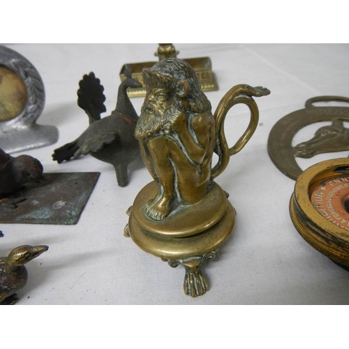 547 - A mixed lot of small brass and bronze items including Chamber Candlestick, animals, hat pin stand, B... 